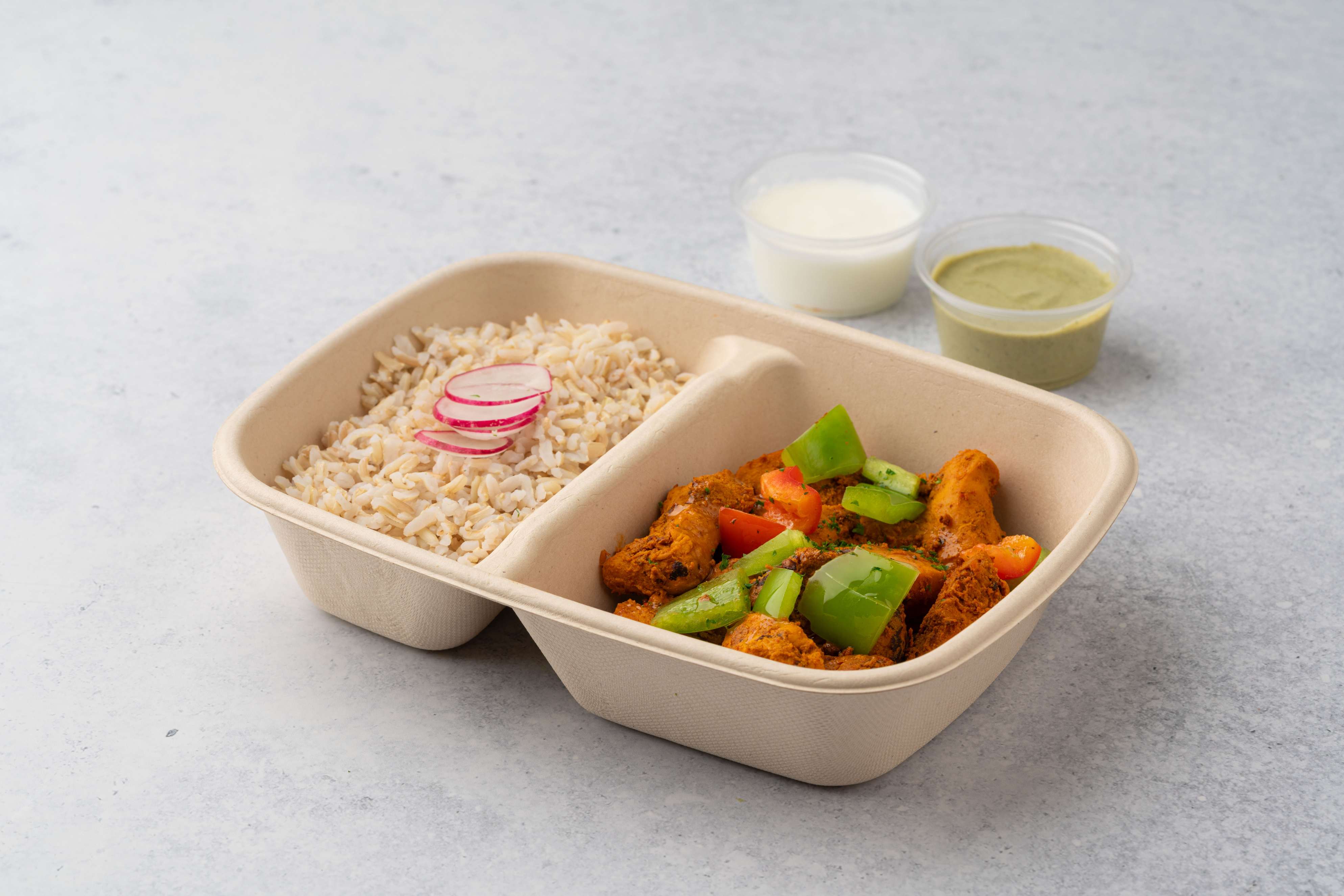 Tandoori Chicken With Brown Rice And Yogurt Sauce And Mint Sauce